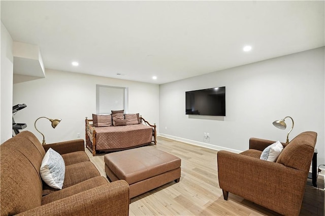 704 E 110th Ter, Kansas City, MO 64131 - living area with light wood-type flooring and recessed lighting