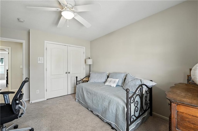 2353 SW Switchback Ct, Lees Summit, MO 64082 - bedroom featuring carpet flooring, a closet, and a ceiling fan