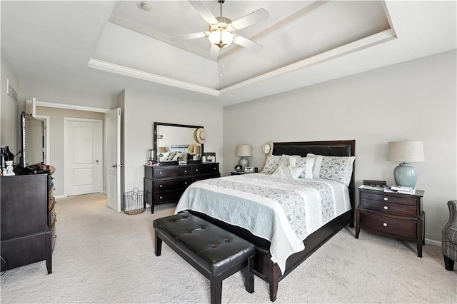 2353 SW Switchback Ct, Lees Summit, MO 64082 - bedroom featuring a raised ceiling, light colored carpet, and a ceiling fan