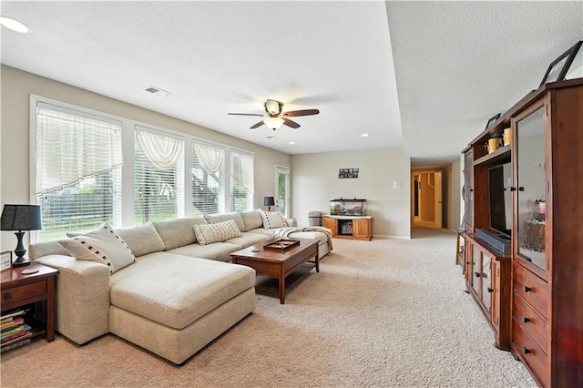 2353 SW Switchback Ct, Lees Summit, MO 64082 - living area featuring light colored carpet, ceiling fan, and recessed lighting