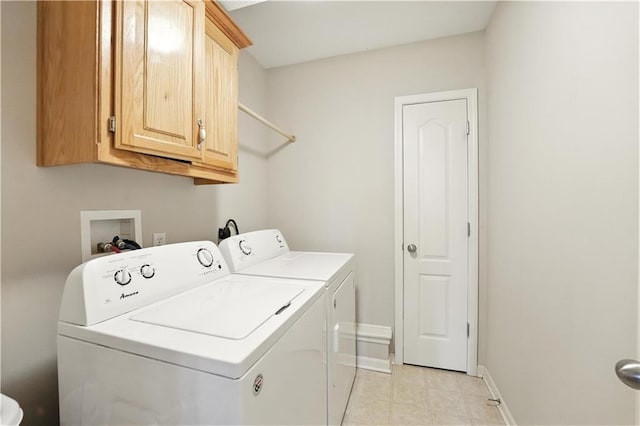 2353 SW Switchback Ct, Lees Summit, MO 64082 - laundry area featuring washing machine and dryer and cabinet space