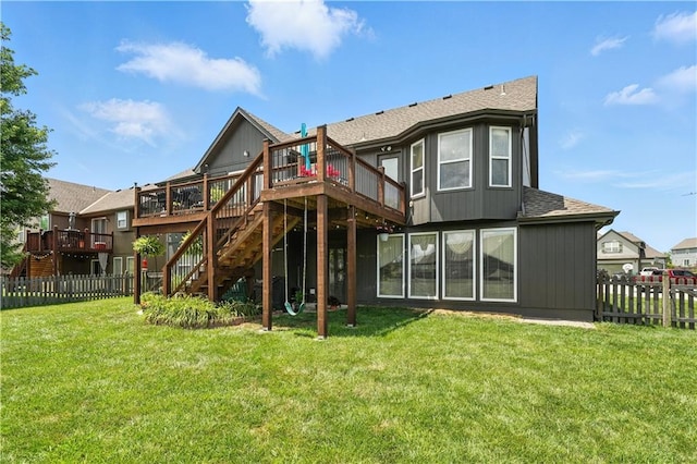 2353 SW Switchback Ct, Lees Summit, MO 64082 - rear view of property with a deck, stairs, a fenced backyard, and roof with shingles