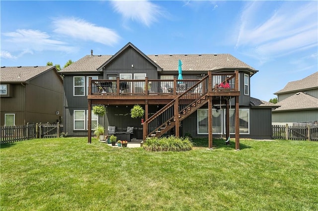 2353 SW Switchback Ct, Lees Summit, MO 64082 - rear view of property with a wooden deck, a fenced backyard, stairway, and a patio