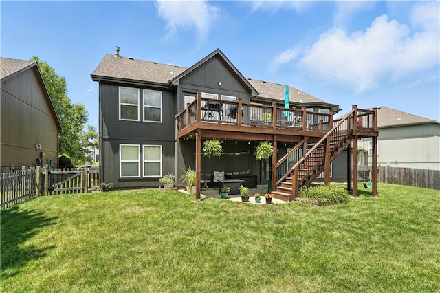 2353 SW Switchback Ct, Lees Summit, MO 64082 - back of property with a fenced backyard, a deck, a patio area, stairway, and roof with shingles