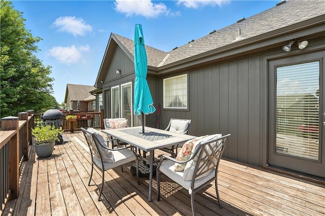 2353 SW Switchback Ct, Lees Summit, MO 64082 - wooden deck featuring outdoor dining area and area for grilling