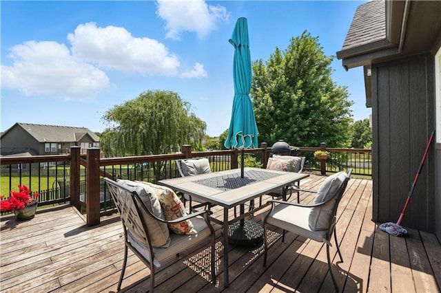 2353 SW Switchback Ct, Lees Summit, MO 64082 - wooden terrace featuring outdoor dining space