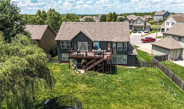 2353 SW Switchback Ct, Lees Summit, MO 64082 - back of house featuring a wooden deck, a residential view, a fenced backyard, and stairs