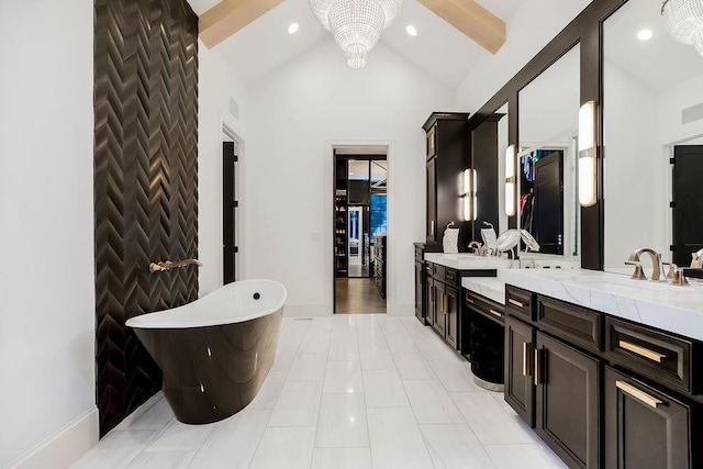 27497 W 108th St, Olathe, KS 66061 - full bathroom featuring vanity, a freestanding bath, recessed lighting, and tile patterned floors