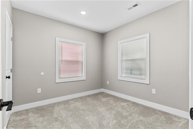 341 N 15th St, Kansas City, KS 66102 - carpeted spare room with baseboards and recessed lighting