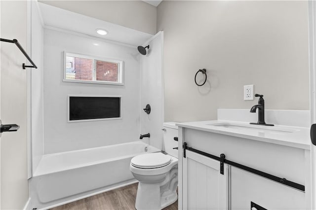 341 N 15th St, Kansas City, KS 66102 - full bathroom featuring bathing tub / shower combination, vanity, and wood finished floors