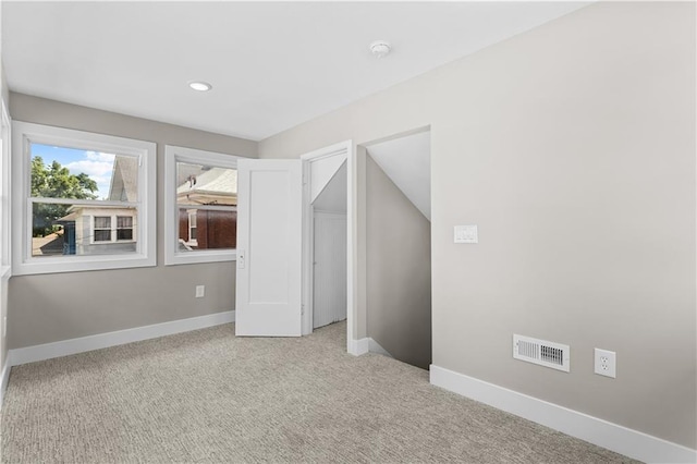341 N 15th St, Kansas City, KS 66102 - unfurnished bedroom featuring carpet floors, recessed lighting, and a closet