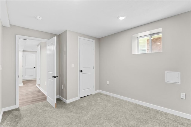 341 N 15th St, Kansas City, KS 66102 - below grade area with carpet and recessed lighting