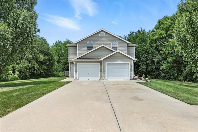 1501 SW Shelby Dr, Lees Summit, MO 64081 - view of front of house with driveway and a front lawn