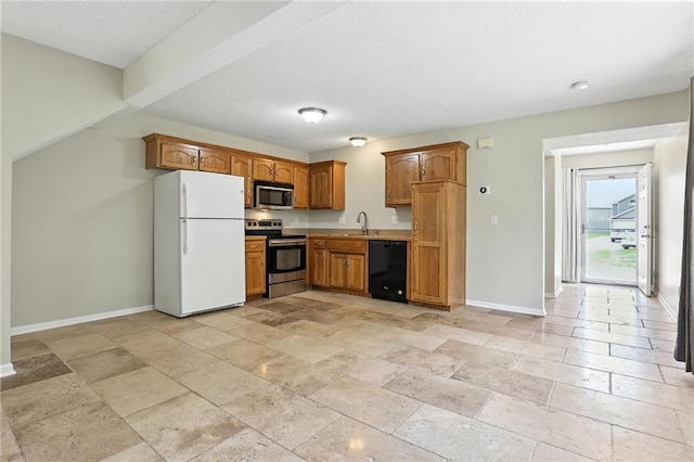 1501 SW Shelby Dr, Lees Summit, MO 64081 - kitchen with appliances with stainless steel finishes, stone tile flooring, brown cabinetry, light countertops, and a textured ceiling