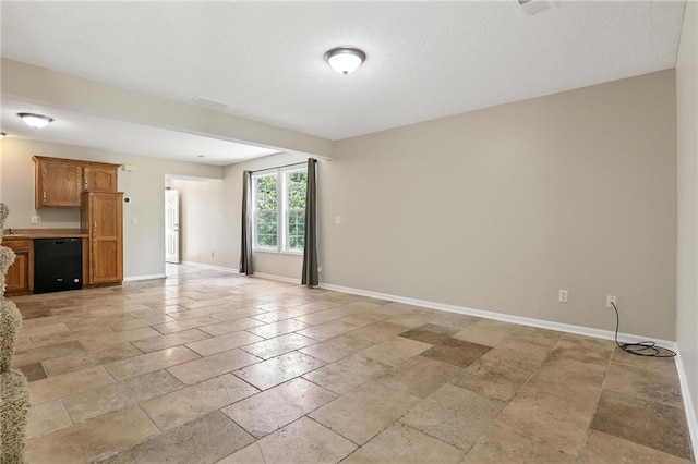 1501 SW Shelby Dr, Lees Summit, MO 64081 - unfurnished living room featuring stone tile flooring and baseboards