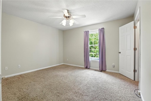 1501 SW Shelby Dr, Lees Summit, MO 64081 - carpeted empty room featuring a ceiling fan and a textured ceiling