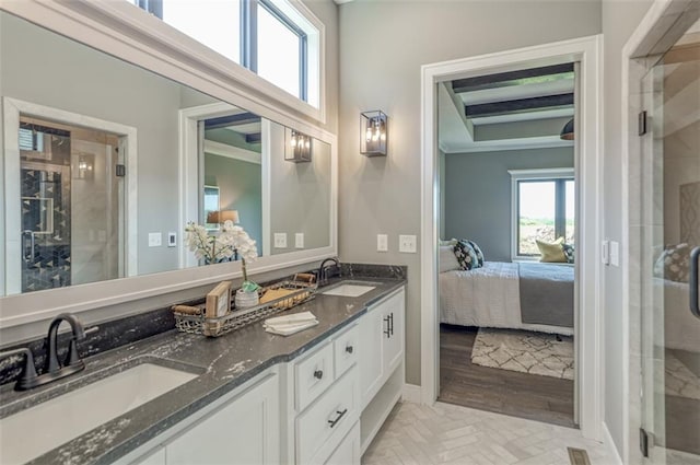15389 W 173rd Ter, Olathe, KS 66062 - bathroom featuring ensuite bathroom, double vanity, a shower stall, and crown molding