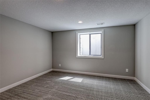 15389 W 173rd Ter, Olathe, KS 66062 - carpeted empty room with a textured ceiling and recessed lighting