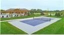 15389 W 173rd Ter, Olathe, KS 66062 - view of sport court featuring a lawn and community basketball court