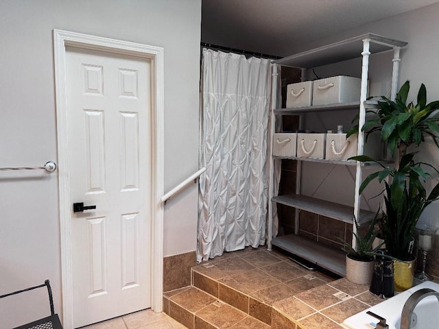 11328 S Rene St, Olathe, KS 66215 - bathroom with tile patterned flooring and a shower with shower curtain
