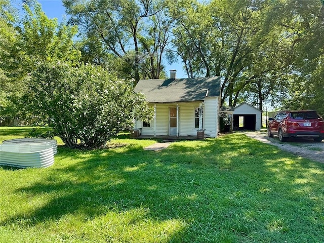 810 Center St, Pleasanton, KS 66075 - bungalow-style house featuring a front yard