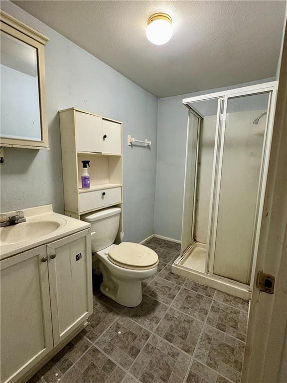 810 Center St, Pleasanton, KS 66075 - full bath featuring vanity, a stall shower, and a textured ceiling
