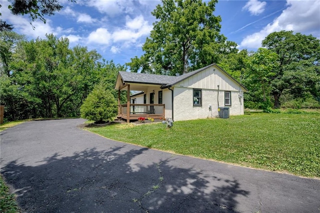 3100 N 56th St, Kansas City, KS 66104 - view of front of house with a front yard and covered porch