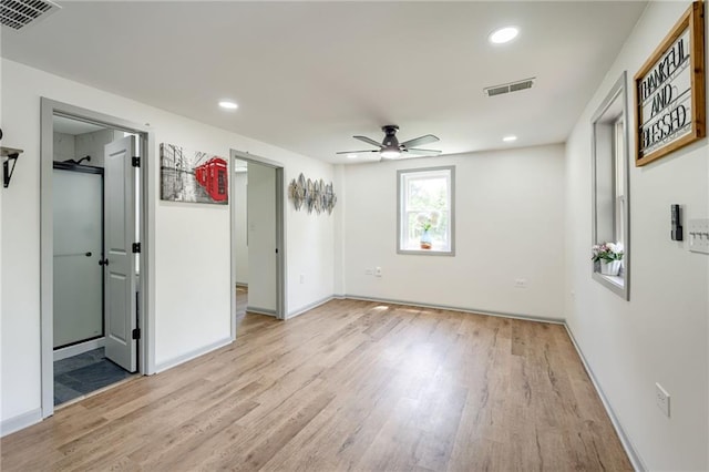 3100 N 56th St, Kansas City, KS 66104 - unfurnished bedroom with light wood finished floors, recessed lighting, and a ceiling fan