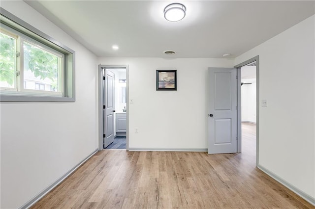 3100 N 56th St, Kansas City, KS 66104 - unfurnished room with light wood-style flooring
