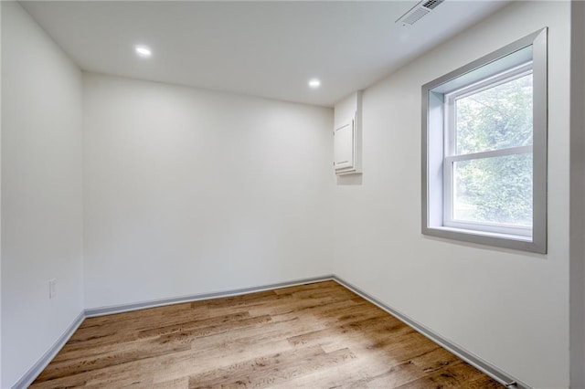 3100 N 56th St, Kansas City, KS 66104 - empty room featuring wood finished floors and recessed lighting