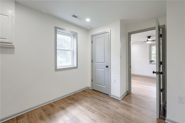 3100 N 56th St, Kansas City, KS 66104 - unfurnished bedroom featuring light wood-style floors
