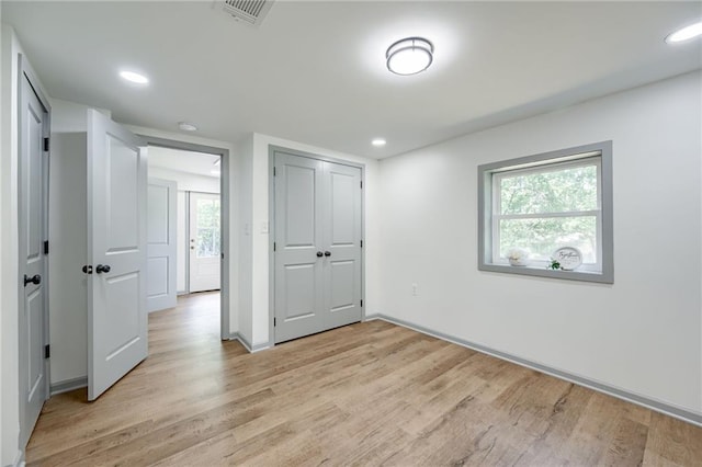 3100 N 56th St, Kansas City, KS 66104 - unfurnished bedroom featuring light wood-style floors, recessed lighting, and a closet