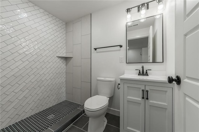 3414 Georgia Ave, Kansas City, KS 66104 - full bath with vanity, tile patterned flooring, and tiled shower