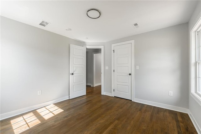 3414 Georgia Ave, Kansas City, KS 66104 - empty room with wood finished floors and baseboards