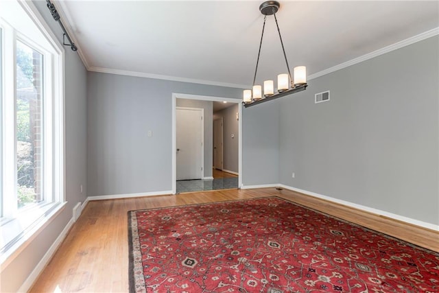 8224 Linden Dr, Prairie Village, KS 66208 - unfurnished room featuring wood finished floors and crown molding