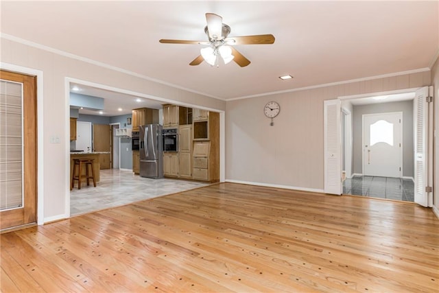 8224 Linden Dr, Prairie Village, KS 66208 - unfurnished living room with crown molding, light wood-style floors, and a ceiling fan