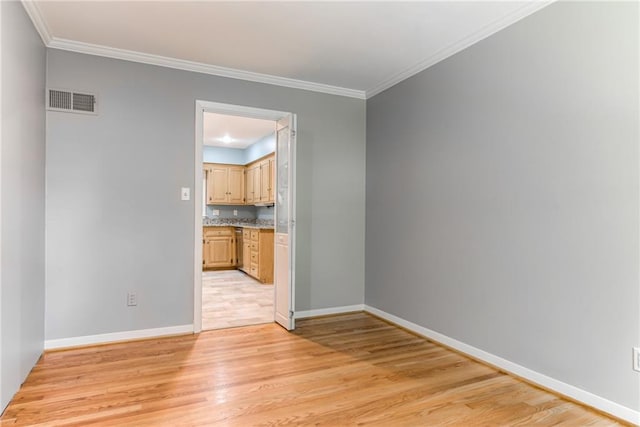 8224 Linden Dr, Prairie Village, KS 66208 - empty room with light wood-style floors and crown molding
