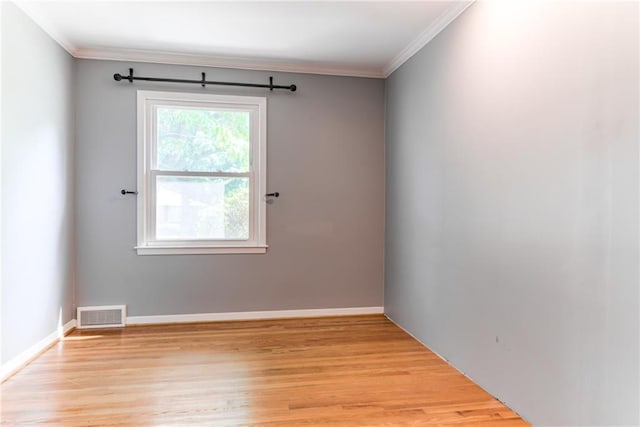 8224 Linden Dr, Prairie Village, KS 66208 - empty room featuring crown molding and light wood-type flooring
