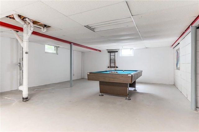 8224 Linden Dr, Prairie Village, KS 66208 - playroom featuring finished concrete flooring, healthy amount of natural light, and billiards table