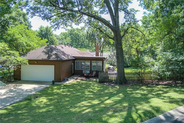 8224 Linden Dr, Prairie Village, KS 66208 - view of front of home with a chimney, an attached garage, concrete driveway, a sunroom, and roof with shingles