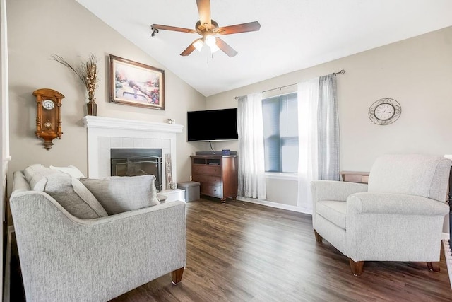 31241 W 172nd Ter, Gardner, KS 66030 - living room with ceiling fan, dark wood-style floors, a tiled fireplace, and vaulted ceiling