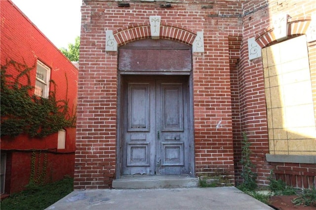 1705 Francis St, Saint Joseph, MO 64501 - view of exterior entry featuring brick siding