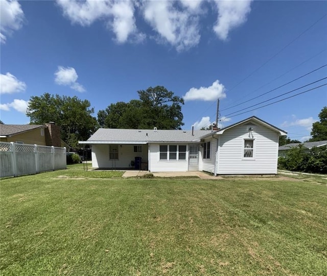 704 S Allen Ave, Chanute, KS 66720 - back of house featuring a patio