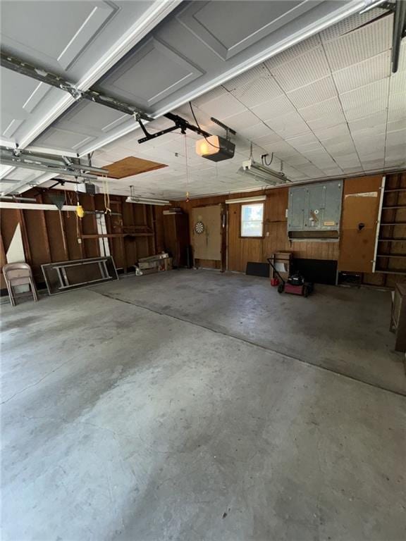 704 S Allen Ave, Chanute, KS 66720 - garage featuring a garage door opener