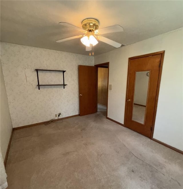 704 S Allen Ave, Chanute, KS 66720 - carpeted spare room with ceiling fan and baseboards