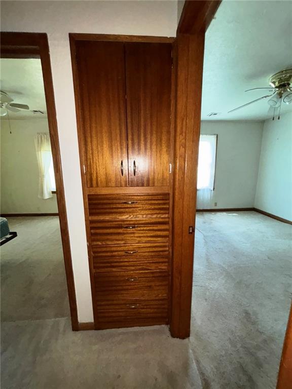 704 S Allen Ave, Chanute, KS 66720 - detailed view of a ceiling fan and carpet