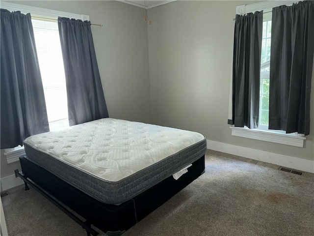 515 W 7th Ave, Garnett, KS 66032 - bedroom featuring baseboards and carpet flooring