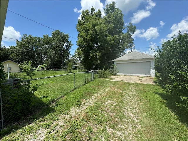 515 W 7th Ave, Garnett, KS 66032 - view of yard with an outbuilding and a garage