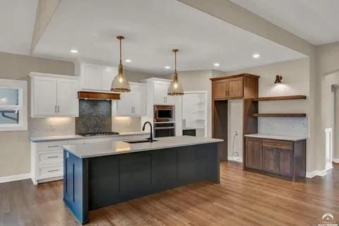 25446 W 91st Ter, Lenexa, KS 66227 - kitchen with appliances with stainless steel finishes, white cabinets, backsplash, light countertops, and recessed lighting