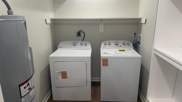 1106 S Mitchell St, Warrensburg, MO 64093 - washroom featuring water heater and washing machine and dryer